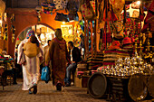 Morocco,Women walking through souk,Marrakesh