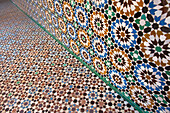 Morocco,Detail of mosaic wall and floor in Ben Youssef Medersa,Marrakesh