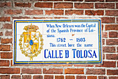 USA,Louisiana,French Quarter,New Orleans,Historical sign on bricked wall