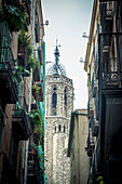 Spain,Street view of cathedral tower,Barcelona