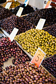 Greece,Variety of Greek olives for sale at market stall,Thessaloniki