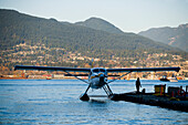 Seaplane Moored To Pier,Vancouver Waterfront,Harbor,Vancouver,British Columbia,Canada