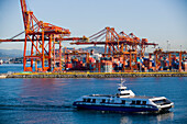 Ferry Passing By Cranes,Vancouver Waterfront,Harbor,Vancouver,British Columbia,Canada