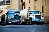 Cement Mixer Truck And Trolley Bus Waiting To Pass At Junction,Vancouver,British Columbia,Canada