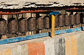 Copper Prayer Wheels And Painted Wall,Geling,Upper Mustang Valley,Nepal