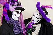 People In Venetian Costumes During Venice Carnival,Venice,Italy