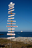 Sign At Bear Island,With Cruise Ship In Distance,Svalbard,Norway