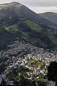 Neighborhoods on the hills surrounding the city of Quito,Quito,Ecuador