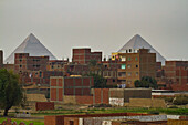 Pyramids behind the town of Giza,Giza,Egypt