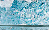 Hollow in the Monacobreen Glacier ice cliff immediately after an avalanche,Spitsbergen,Svalbard,Norway