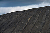 Two hikers on the top of a crater in Hverfjall,Iceland,Iceland