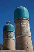 Birds perched in a basket on Chor Minor Madrasah in Bukhara,Uzbekistan,Bukhara,Uzbekistan