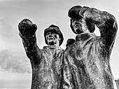 Stone sculpture of two fishermen looking out,Reykjavik,Reykjavik,Iceland