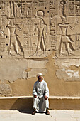 Caretaker,Wall of Reliefs,Karnak Temple Complex,UNESCO World Heritage Site,Luxor,Egypt