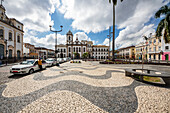 Taxi stand along the Terreiro de Jesus with the Church of St Peter of the Clergymen and the Church of the Third Order of Penitence of Saint Dominic of Osma,Salvador,Bahia,Brazil