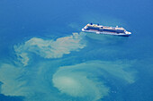 Aerial view of a cruise ship touring the Cape York Peninsula on the east coast of Queensland,Australia