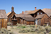 A church and several abandoned homes in Bodie Ghost Town.,Bodie State Historic Park,Bridgeport,California