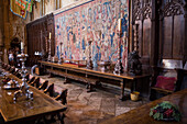 Tourists enter the dining room at Hearst Castle,which has extensive furniture,tables,tapestries,sculptures and artwork.,Hearst Castle,San Simeon,California