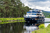 Tour boat cruises along the Caledonian Canal near Fort Augustus,Scotland,Fort Augustus,Scotland