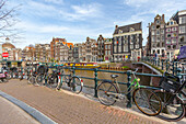 Bicycles parked on canal bridge,Singel in Amsterdam,Amsterdam,North Holland,Netherlands