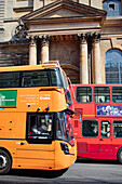 Double-decker buses on the go in Oxford,UK,Oxford,England