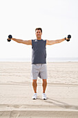 Man Exercising on Beach