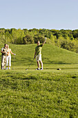 Group of People Golfing