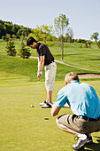 Men Playing Golf