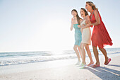 Group of Women Walking on Beach,Florida,USA