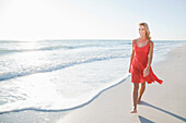 Woman Walking on Beach,Florida,USA