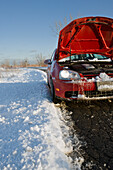 Car Trouble on Winter Country Road