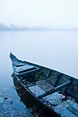 Canoe in Morning Mist at Sras Srang,Angkor,Cambodia