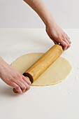 Hands Rolling Pastry Dough