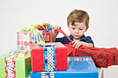 Young Boy opening Birthday Presents