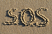 SOS Written in Sand