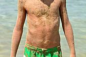 Boy Covered in Sand,Saint-Florent,Corsica,France