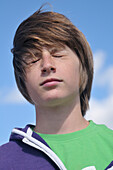 Close-up Portrait of Boy with Eyes Closed