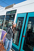 Woman Getting On Transit,Mannheim,Baden-Wurttemberg,Germany