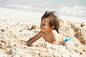 Baby Boy in Sand at Beach,Mexico