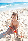 Baby Boy Playing in Sand,Playa del Carmen,Yucatan Peninsula,Mexico