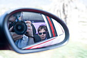 Man Taking Picture in Side View Mirror,Mexico