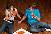 Children Eating Pizza