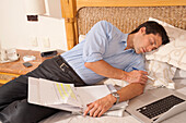 Man using Laptop in Hotel Room,Reef Playacar Resort and Spa,Playa del Carmen,Mexico