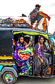Young Indians in an autorickshaw near Dediapada,Gujarat,India,Asia