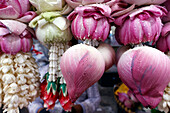 Flower garlands as temple offerings for Hindu ceremony,Indian flower shop at Sri Maha Mariamman Temple,Bangkok,Thailand,Southeast Asia,Asia