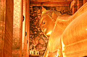 The giant golden reclining Buddha at Wat Pho (Temple of the Reclining Buddha),Bangkok,Thailand,Southeast Asia,Asia