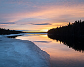 Channel leading to Lake Likapera at sunset,Finland,Europe