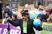 Environmental activists and supporters attend the March For Climate And Justice on November 12,2023 in Amsterdam,Netherlands. Protestors demand action from the Dutch government and world leaders to combat the climate change crisis,heat records are being broken again and again,resulting in profound changes for all life on Earth. An estimated 70,000 people have walked on Sunday with the climate march in Amsterdam,according to the Amsterdam municipality.