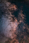 This frames the bright Scutum Starcloud at centre and surrounding region of the Milky Way,with the bright starfields contrasting with the dark lanes and obscuring dust in this region of the Milky Way. The bright star cluster Messier 11,or the Wild Duck Cluster,is left of centre embedded in the Starcloud. The smaller star cluster M26 is below it. At bottom right,the star cluster set in a dark lane and above the blue star is NGC 6649. That blue star has a small reflection nebula around it,IC 1287.