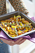 Potato wedges with rosemary and onions